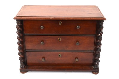 Lot 974 - Rare Regency Irish miniature mahogany chest of three drawers with original label 'Austin, Dublin'