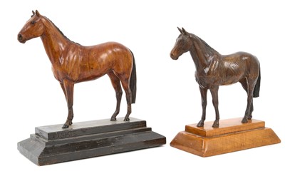 Lot 847 - Two early 20th century. carved wooden sculptures of racehorses, signed D.H.