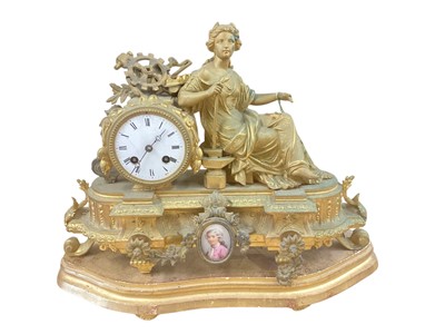 Lot 2600 - 19th century French Spelter figural mantel clock on wooden base, 36cm in height (including base).