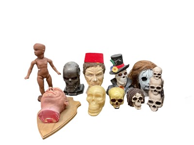 Lot 2534 - A group of horror figure heads and a figure of a doll.