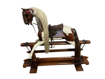 Lot 2652 - Fine Stevenson Brothers limited edition 'Tinkerbell' rocking horse, the oak 'pinto' body painted to match the Queen's favourite horse, with a white / brown mane