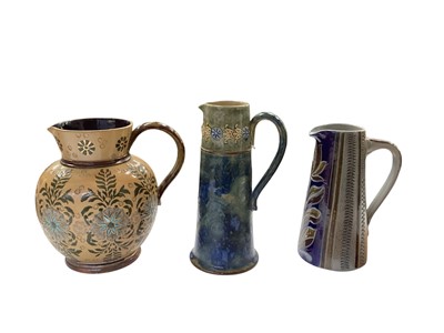 Lot 1297 - Doulton Lambeth stoneware jug, together with another Royal Doulton jug and another jug (3)