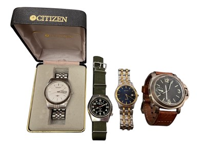 Lot 232 - A group of four gentlemen's wristwatches to include a West End Watch co, automatic military style wristwatch, a boxed citizen automatic day-date, a accurist quartz wristwatch aperture at 3 o'cloc...