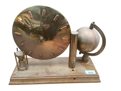 Lot 2639 - Soviet Majak desk clock together with an unusual brass mantel clock (2)
