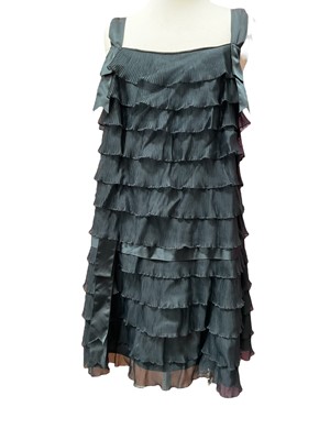 Lot 2142 - 1960s Charnos black ruffle short nightie with black ribbon details. Wong Bros. & Co wool with sequinned evening top, black silk mix Decor Elegance evening top size XL and a contemporary bla...