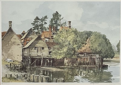 Lot 174 - Stanley Orchart (1920-2005) signed print - A Riverside Mill, 34cm x 48cm, in glazed frame