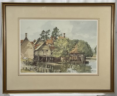Lot 174 - Stanley Orchart (1920-2005) signed print - A Riverside Mill, 34cm x 48cm, in glazed frame