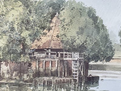 Lot 174 - Stanley Orchart (1920-2005) signed print - A Riverside Mill, 34cm x 48cm, in glazed frame