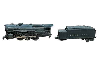 Lot 2727 - Lionel Corporation train and carriage, 0-6-2, train marked 675 on the side of the cabin, length for train is approximately 26cm, the carriage is marked Lionel Lines on both sides