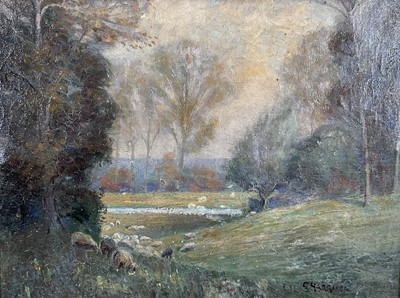 Lot 248 - C.Harrison, oil on canvas - Wooded lake landscape with sheep 26.5cm x 36cm, signed