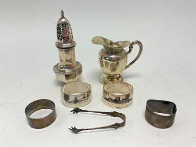 Lot 77 - Silver sugar castor, pair of silver sugar tongs, Continental silver (800) cream jug and silver napkin rings
