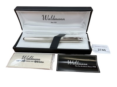 Lot 2740 - Waldmann fountain pen in engine turned silver case (stamped 925), with original box.