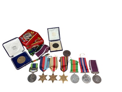 Lot 816 - 1930s and later medal group comprising George V India General Service medal with one clasp- North West Frontier 1930 - 1931, named to 2607179 BMBR. C. H. Peachey. R.A., 1939 - 1945 Star, Africa...