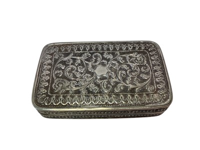 Lot 253 - White metal snuff box with embossed floral scroll decoration