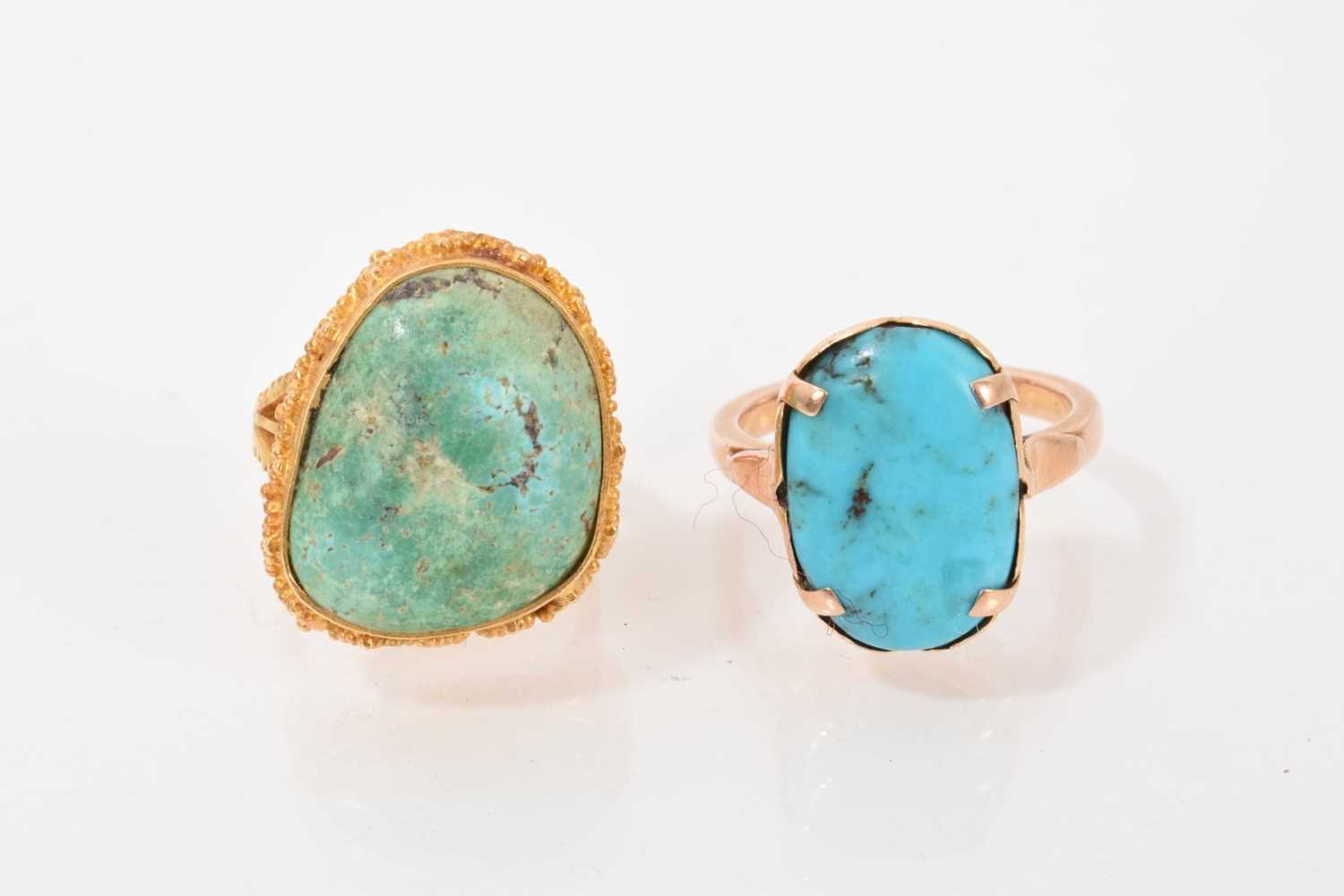 Lot 540 - Two turquoise dress rings in gold setting