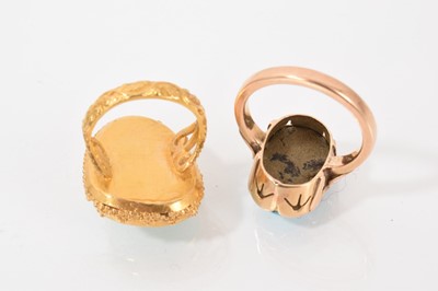 Lot 540 - Two turquoise dress rings in gold setting