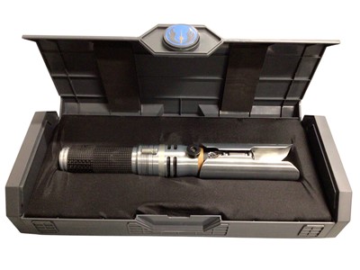 Lot 16 - Disney Star Wars Cal Kestis lightsaber hilt, in box with 36" blade (1)