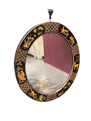 Lot 1523 - Black and gilt japanned oval wall mirror