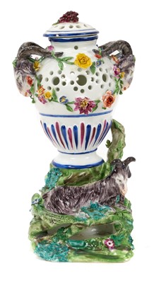 Lot 251 - Continental porcelain pot pourri vase and cover, modelled with a goat