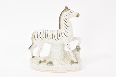 Lot 168 - Staffordshire pottery model of a zebra, circa 1850