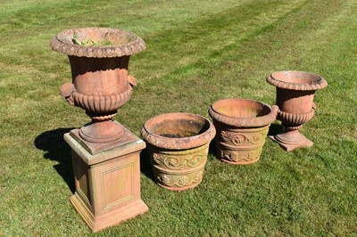 Lot 1417 - Pair of terracotta style garden urns and other pots