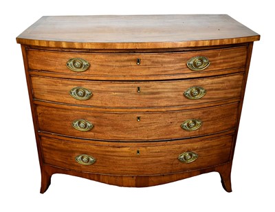 Lot 1416 - George III mahogany bowfront chest of four drawers