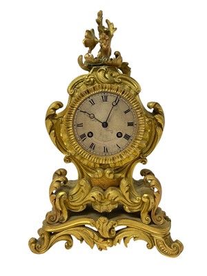 Lot 730 - 19th century French ormolu mantel clock with silvered dial and ornate floral scroll case
