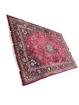 Lot 1574 - Large Iranian carpet with central medallion