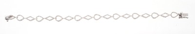 Lot 591 - Diamond geometric bracelet set with single cut diamonds in 9ct white gold setting