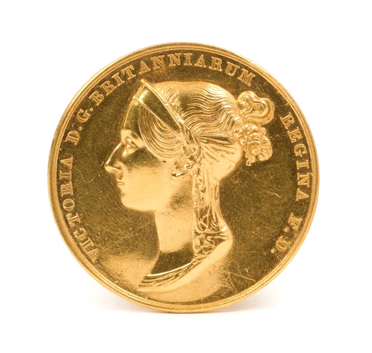 Lot 71 - H.M. Queen Victoria Coronation 1838 Gold Medal by B. Pistrucci, struck with bust of the Queen, 'Victoria D.G. Britanniarum Regina F.D.' and to the reverse Victoria on her throne being offered the...