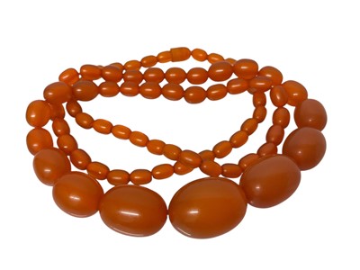 Lot 645 - Old reconstituted amber bead necklace