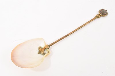 Lot 780 - 19th century brass and mother of pearl caviar serving spoon
