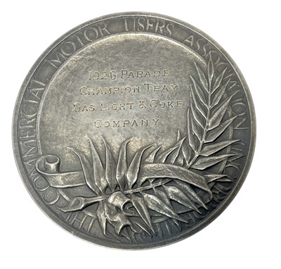 Lot 58 - 1920's Commercial Motor Users Association 1926 Parade white metal medal/medallion, engraved 1926 Parade Champion Team Gas Ligth & Coke Company, 56mm in diameter in velvet lined fitted case.