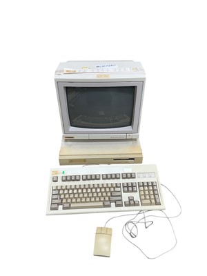 Lot 2439 - Two early computers with accessories
