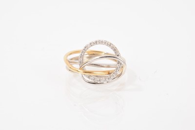 Lot 592 - Contemporary 18ct white and yellow gold diamond ring of abstract design