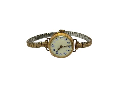 Lot 114 - French gold and floral enamel ladies wristwatch on a later gold plated expandable bracelet