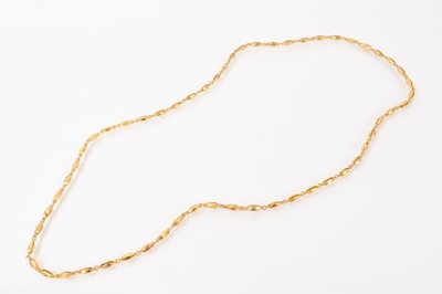 Lot 633 - Chinese yellow metal necklace with oval bead links and Chinese characters to the hook clasp, 65cm long