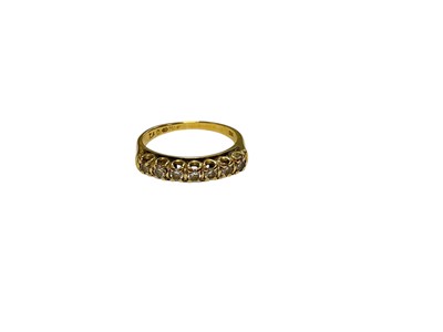 Lot 120 - 18ct gold diamond seven stone ring