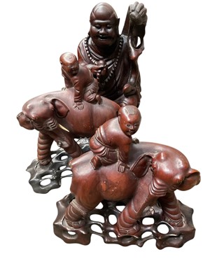 Lot 818 - Three Chinese carved hardwood figures