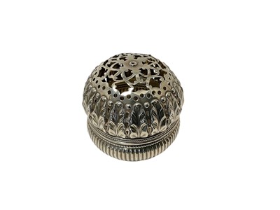 Lot 138 - American silver potpourri container of globular form, with foliate decorated slip on cover and fluted base (stamped sterling). All at approximately 2ozs. 8cm diameter.