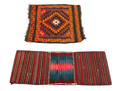 Lot 1594 - Kelim saddlebag with geometric ornament, 129 x 46cm and a small kelim
