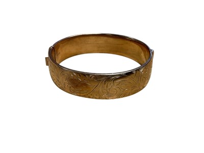 Lot 51 - 9ct gold hinged bangle
