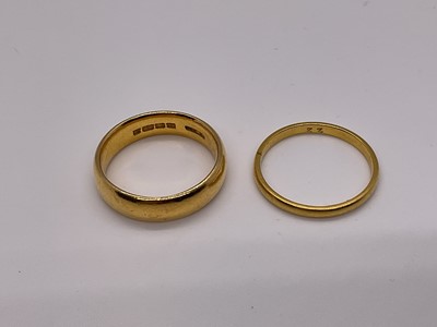 Lot 52 - 22ct gold wedding ring and a yellow metal wedding ring (2)