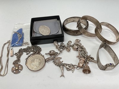 Lot 1148 - Three silver bangles, silver charm bracelet, Rotary silver wristwatch, etc