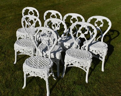 Lot 1420 - Decorative set of eight 19th century style aluminium garden chairs with pierced lift out seats together with eight loose green squabs