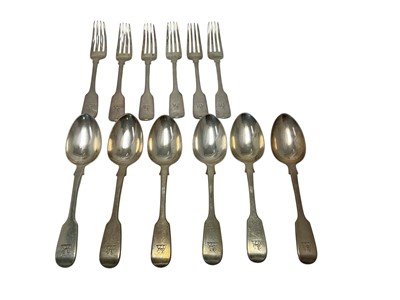 Lot 308 - Six William IV silver Fiddle pattern dessert spoons, with engraved armorial crests