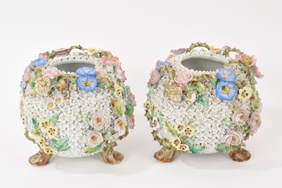 Lot 135 - Pair of late 19th century Continental floral encrusted vases