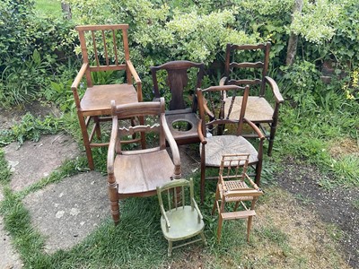 Lot 1466 - Seven various child's chairs, the tallest a fruitwood and elm high chair, 82cm high