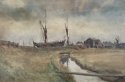 Lot 164 - Attributed to Arthur Briscoe (1920-1997) watercolour - Barges on the Shore, 22cm x33cm, in glazed frame