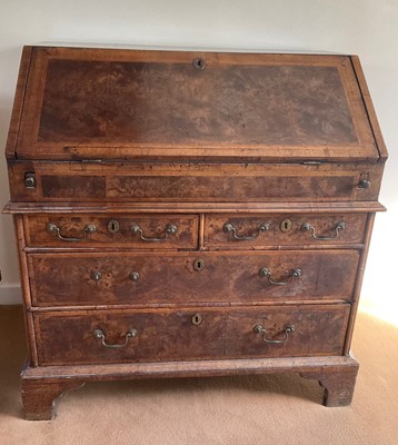 Lot 1526 - Early 18th century walnut and featherbanded bureau